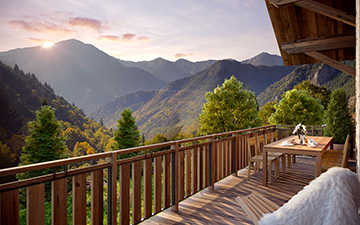 Rendu 3D d'une terrasse de chalet avec vue sur les montagnes